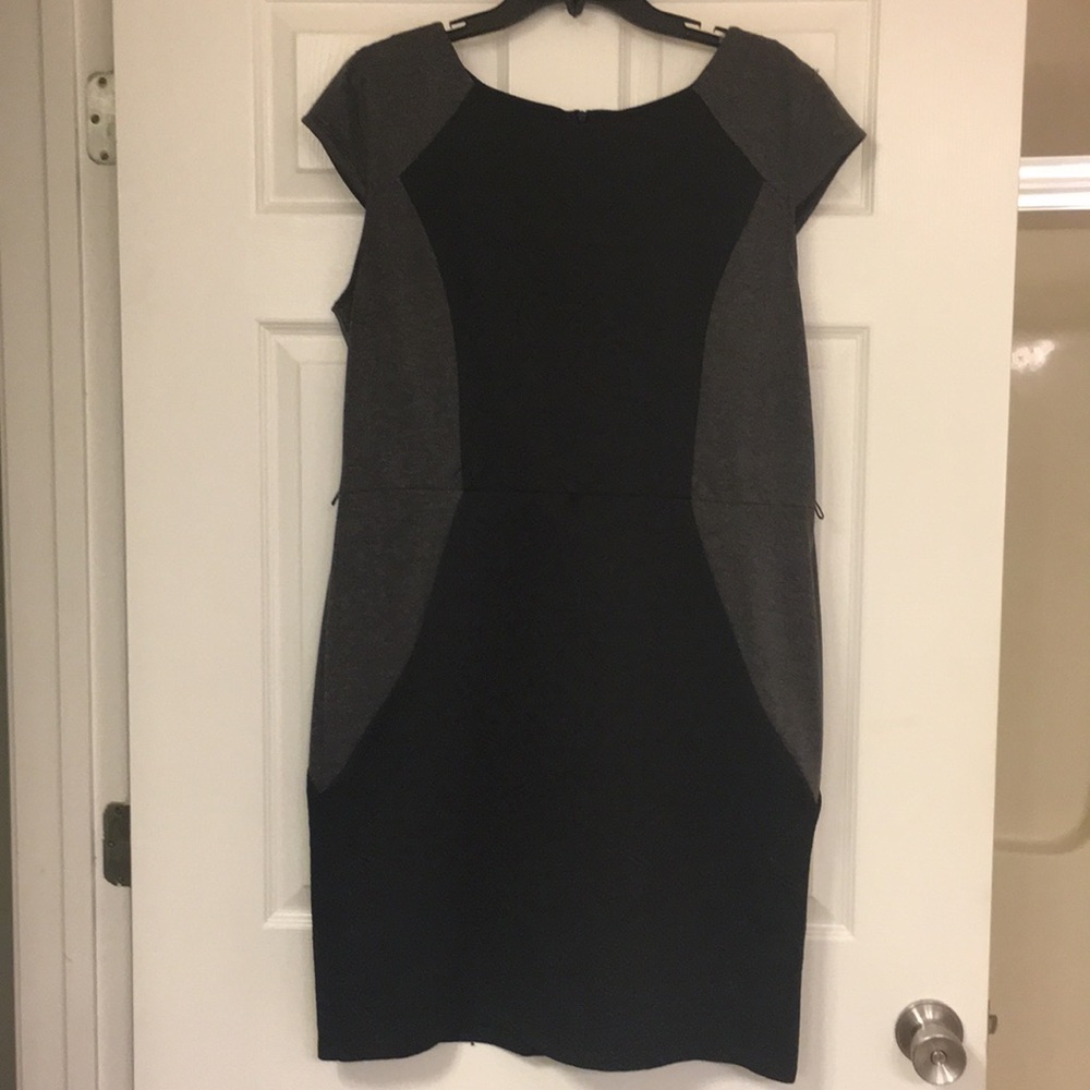 Black and grey sleeveless dress.